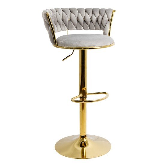 Bar stool with gray velvet upholstery and golden base